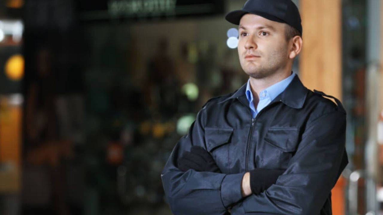 Man in uniform standing confidently.